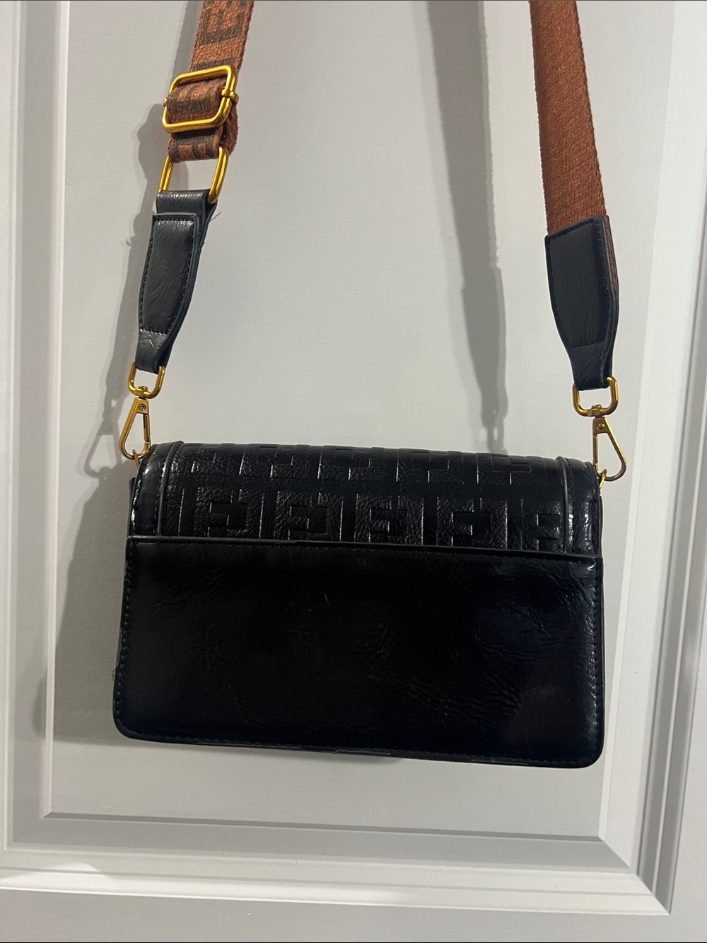 Black Embossed Leather Crossbody Bag with Brown Logo Strap - Picture 4 of 6